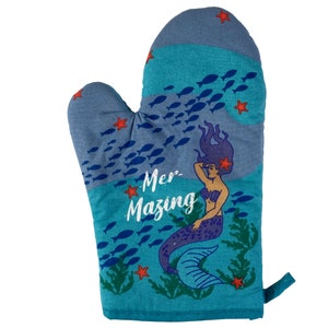 May include: Blue oven mitt with a mermaid design and the text "Mer-mazing". The mermaid is purple and has long flowing hair. The background is a turquoise blue with a school of fish and red stars.