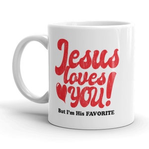 May include: White ceramic coffee mug with a red graphic that says "Jesus loves you! But I'm His FAVORITE".
