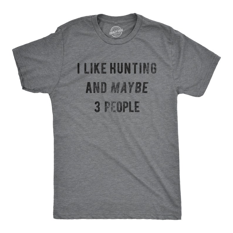 May include: A heather grey t-shirt with the text "I like hunting and maybe 3 people" printed on the front.