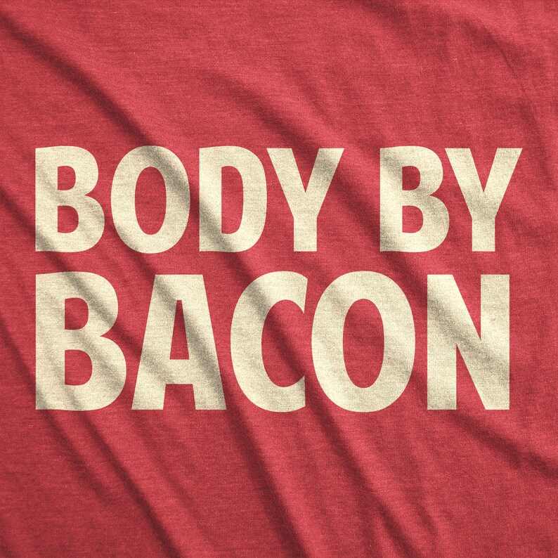May include: Red t-shirt with the text "BODY BY BACON" in white.