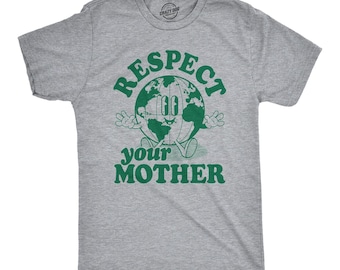 May include: A heather gray short-sleeve t-shirt featuring a green graphic of a cartoon globe with arms, legs, and a face. The text "RESPECT" is arched above the globe, and "your MOTHER" is printed in green below the globe illustration.