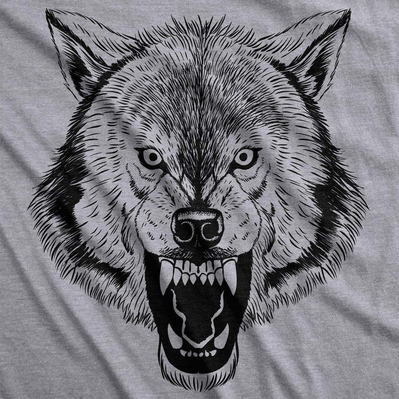 May include: A black and white illustration of a wolf's head with its mouth open and teeth bared. The wolf's eyes are wide and intense.