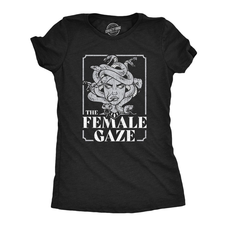May include: Black t-shirt with a white graphic of a woman's face with snakes for hair. The text "THE FEMALE GAZE" is below the image.