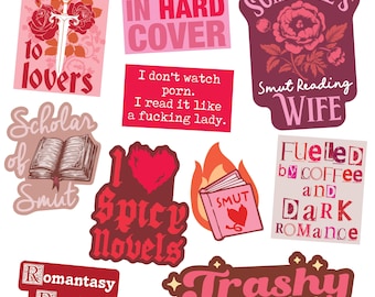 May include: A collection of ten rectangular and shaped stickers featuring pink, red, and maroon color palettes. The designs include text such as enemies to lovers, I want it in hard cover, Smut Reading Wife, Scholar of Smut, and Trashy book club.