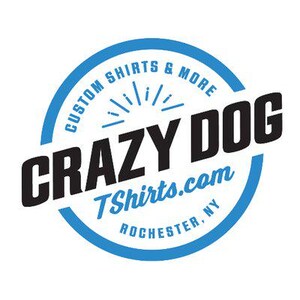 May include: Blue and white circular logo with the text "Custom Shirts & More" and "Crazy Dog" in black. The logo also includes the text "TShirts.com" and "Rochester, NY".