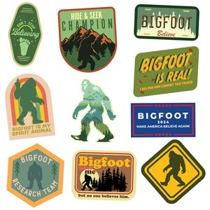 May include: A set of ten colorful stickers featuring various Bigfoot designs. The stickers feature different slogans and images, including "Bigfoot is Real!" and "Bigfoot 2024 Make America Believe Again!"