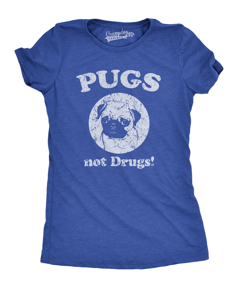 May include: A blue t-shirt with a white distressed graphic that says "PUGS not Drugs!" with a white circle around a pug's face.