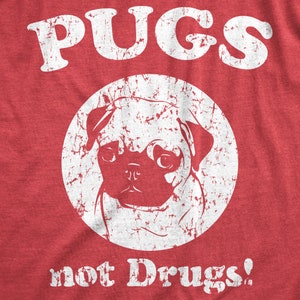 May include: Red t-shirt with a white distressed graphic of a pug with the text "PUGS not Drugs!"