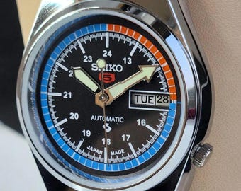 Reloj de pulsera Seiko vintage restaurado para hombre, esfera negra, 36 mm, acero inoxidable.