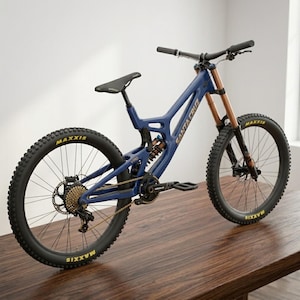 May include: A blue mountain bike with the brand name "Santa Cruz" in white lettering. The bike has black tires with "Maxxis" in yellow, a black seat, and gold chain. The front suspension is a copper color.