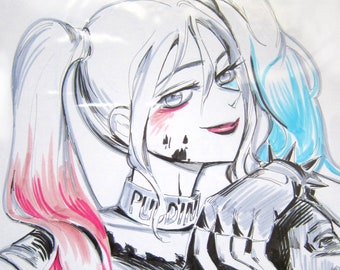 May include: A black and white illustration of a character with pigtails, one pink and one blue. The character has a white shirt with the words "Daddy Lil Monster" and a collar that says "Puddin". The illustration has red accents.