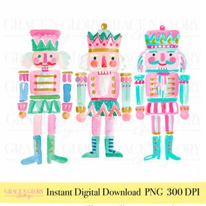 Puede incluir: Tres ilustraciones de cascanueces al estilo acuarela dispuestas en fila. Cada figura presenta una paleta de colores vibrantes en rosa, verde azulado y dorado, vistiendo un uniforme y sombrero decorativos. El texto GRACE N GLORY GALLERY es visible.
