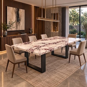 May include: A rectangular dining table with a white and deep purple marble top and a black metal U-shaped base, surrounded by six upholstered beige chairs with dark wooden legs, positioned on a large textured area rug in a modern dining room.