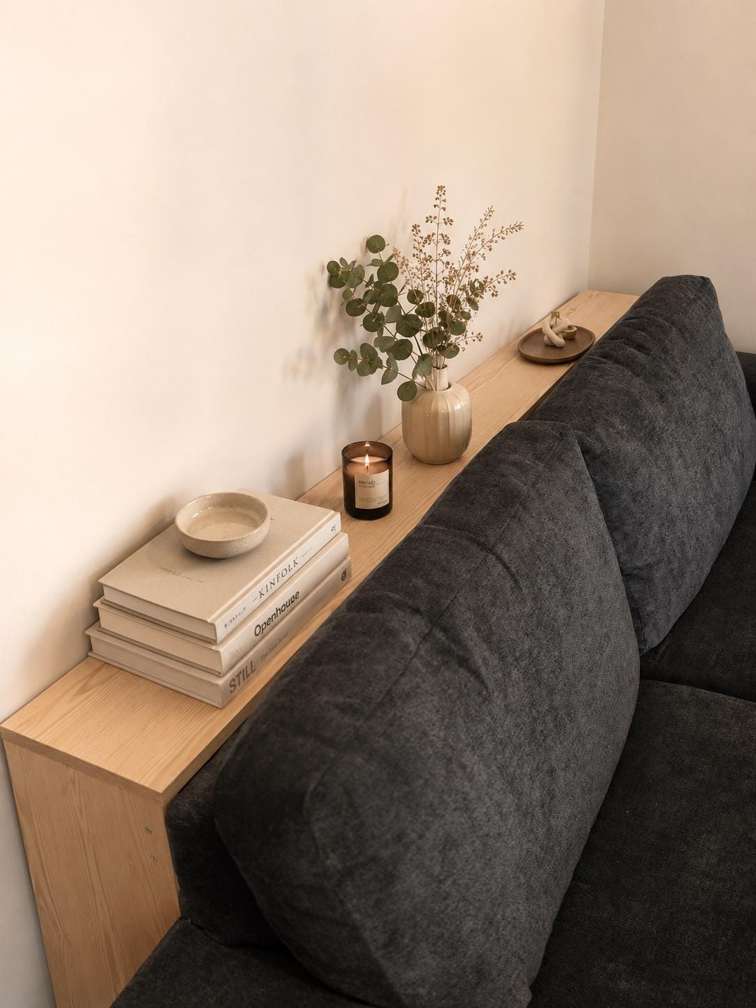Sideboard behind sofa