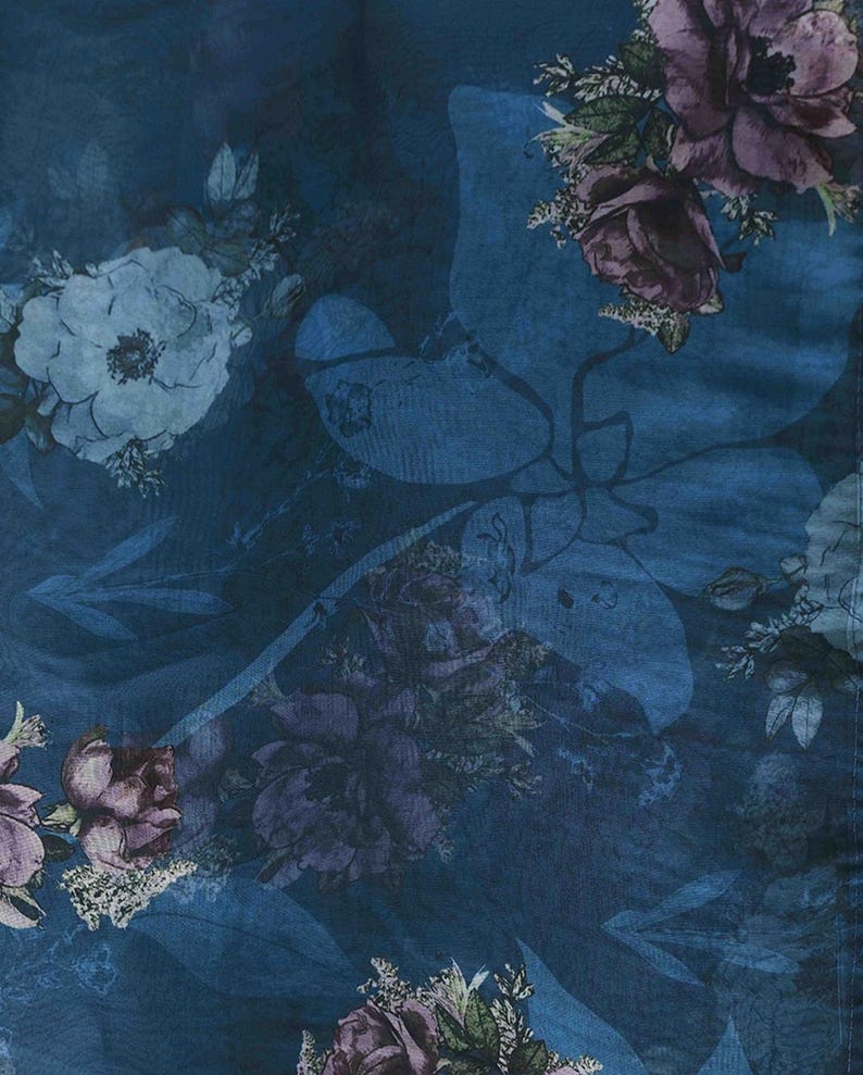 May include: A dark blue floral pattern featuring large, stylized flowers in shades of white, purple, and burgundy. The design includes large leaf shapes and a subtle, textured background, creating a layered, artistic effect.