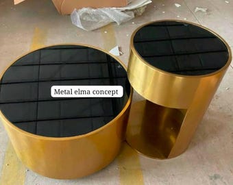 Conjunto multifuncional de mesa de centro e mesas laterais em aço inoxidável.