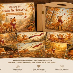 May include: A Kamishibai storytelling set titled Fips und der wilde Herbstwind, featuring a wooden frame and 10 A4 landscape picture cards. The illustrations depict a fox wearing a red scarf in an autumn forest setting with falling leaves.