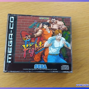 Könnte beinhalten: Ein Mega-CD-Spielcase für "Final Fight Arcade" mit Actionfiguren in Kampfpose vor einer Backsteinmauer. Das SEGA-Logo und das Label "Compact Disc" sind sichtbar.