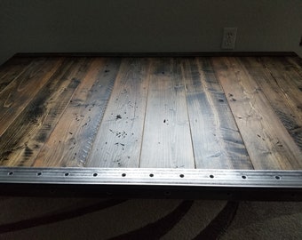 Reclaimed Distressed Custom built Industrial desk with raw steel trim and straight steel legs