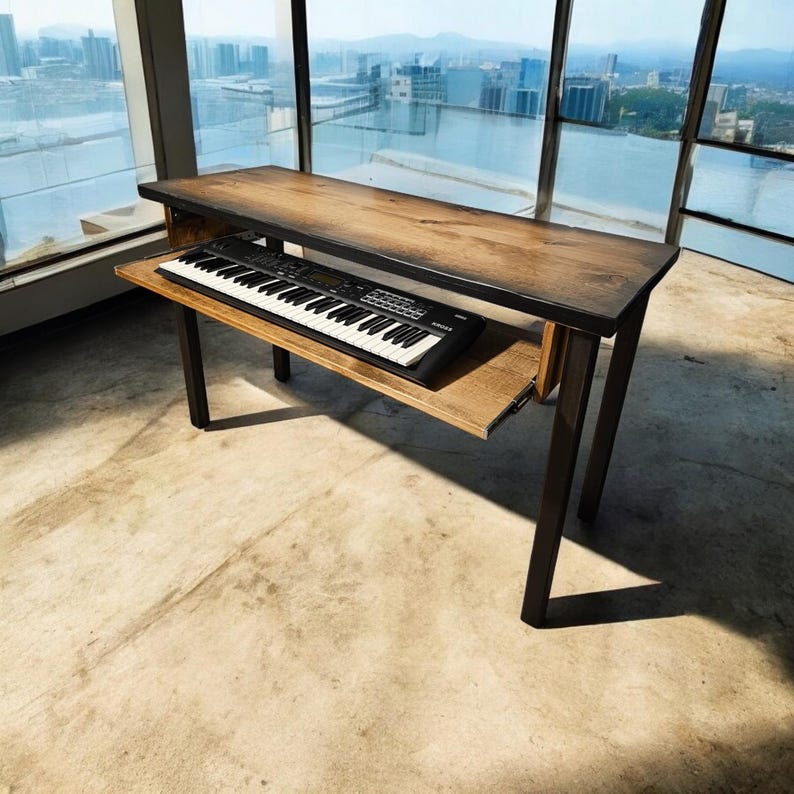 May include: A wooden table with a black metal frame and a pull-out shelf. A black keyboard is on the shelf.