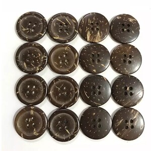 May include: A set of 16 brown coconut shell buttons, each with four holes. The buttons have a natural, rustic look and are ideal for adding a touch of nature to your sewing projects.