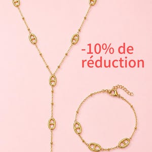 Peut inclure: Un ensemble collier et bracelet doré composé d'une chaîne fine avec des maillons ovales espacés contenant une barre horizontale. Le collier présente un design en Y. Le texte -10% de réduction est visible en rouge sur la droite.