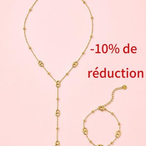 Peut inclure: Un collier lariat et un bracelet assorti de couleur dorée, composés d'une fine chaîne avec des petites perles régulièrement espacées et des maillons ovales. Le collier présente un design en Y. Le texte -10% de réduction est visible.