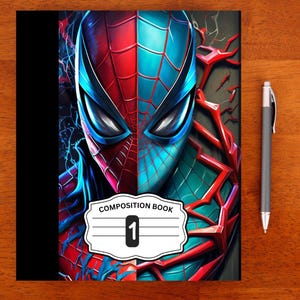 May include: A composition book featuring a split-face graphic of a masked superhero in red and blue with a web pattern. The cover includes a white label with the text COMPOSITION BOOK and the number 1. A gray ballpoint pen is positioned to the right.