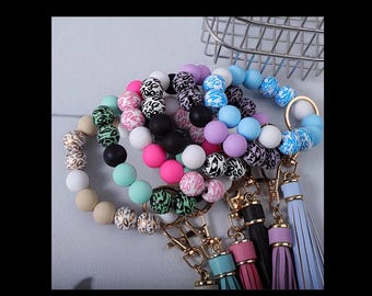 Llavero con cuentas y borla – Elegante accesorio para la muñeca