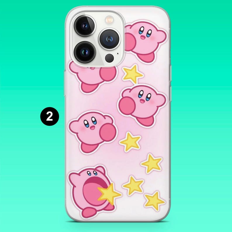 May include: Clear phone case featuring a pink background with cartoon pink characters and yellow stars. The phone case has a clear border and a camera cutout. The number "2" is printed in black on the case.