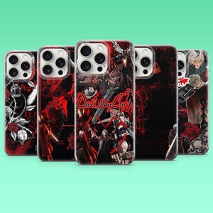 Peut inclure: Plusieurs coques de téléphone avec des motifs rouges et noirs. Les coques présentent des personnages et le texte "Devil May Cry". Certaines coques ont des motifs floraux et de crânes. Elles sont conçues pour différents modèles de téléphones.