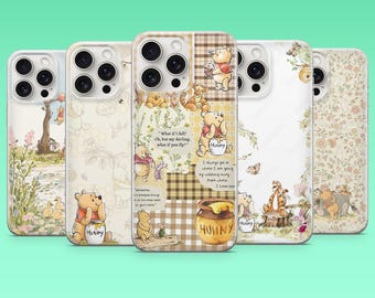 May include: Five phone cases with Winnie the Pooh designs. The cases feature illustrations of Pooh Bear, Piglet, and Tigger, with quotes and honey pots. The cases have a variety of backgrounds, including floral and plaid patterns.