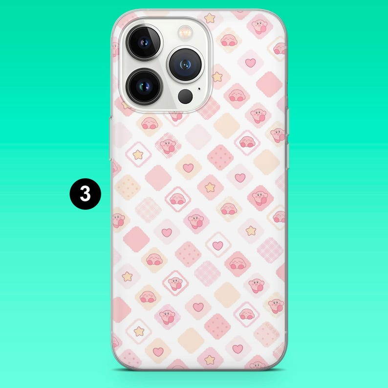 May include: A clear phone case featuring a repeating pattern of pink and peach-colored squares. Each square contains a cartoon character, heart, or star. The phone case is designed to fit a smartphone with three camera lenses.