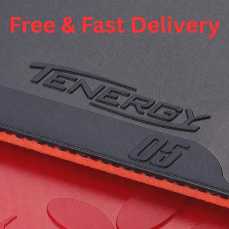 May include: A black table tennis rubber sheet with the embossed text TENERGY 05. The rubber features a textured surface and is layered over a bright orange sponge base. The top portion of the image displays the red text Free & Fast Delivery.