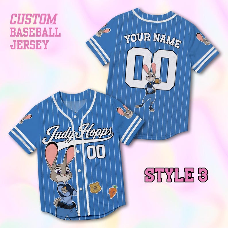 May include: A blue baseball jersey with white pinstripes, featuring the text Judy Hopps and the number 00 on the front, and the text YOUR NAME and 00 on the back. The jersey displays a cartoon rabbit character, a badge, and a carrot graphic.