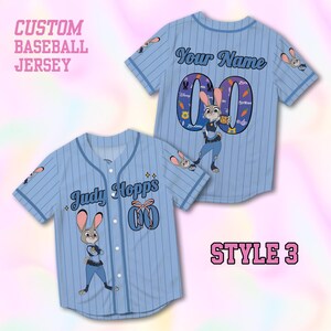 May include: Light blue custom baseball jersey with pinstripes. The jersey features the text "Judy Hopps" and "Your Name" with a cartoon bunny character. The text "CUSTOM BASEBALL JERSEY" and "STYLE 3" are also visible.