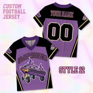May include: A custom football jersey in purple and black with yellow accents. The front features the name RAMONE above a purple car graphic with flames. The back displays the text YOUR NAME and the number 00. Text includes CUSTOM FOOTBALL JERSEY.