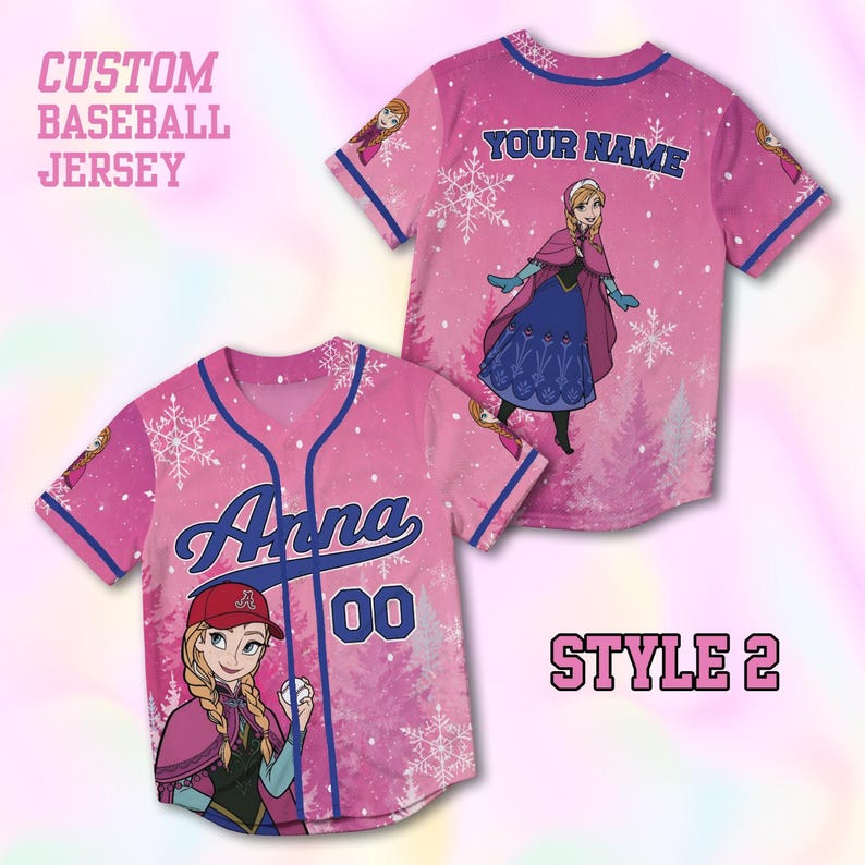 Puede incluir: Camiseta de b&eacute;isbol rosa personalizada con el nombre "Anna" en escritura azul y el n&uacute;mero "00". La camiseta presenta una imagen de dibujos animados de un personaje y el texto "CUSTOM BASEBALL JERSEY" y "STYLE 2".