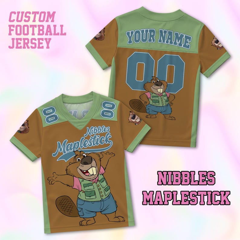 May include: Custom football jersey in brown, green, and blue, featuring a cartoon beaver mascot. The jersey has the text "Nibbles Maplestick" and "Your Name" with the number "00". The jersey is short-sleeved.
