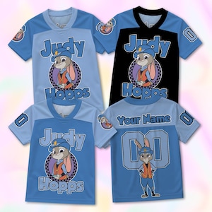 May include: Four short-sleeve jerseys featuring Judy Hopps from Zootopia. Three jerseys display Judy Hopps in a circular frame with the text Judy Hopps. One jersey shows Judy Hopps standing with the text Your Name and the number 00 on the back.