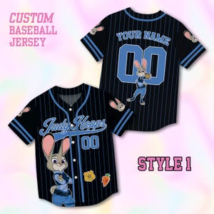 May include: A black baseball jersey with blue pinstripes, featuring Judy Hopps graphics, the text Judy Hopps, Your Name, and 00. The design includes a police badge and carrot icon, with blue striped sleeves and white buttons on the front placket.