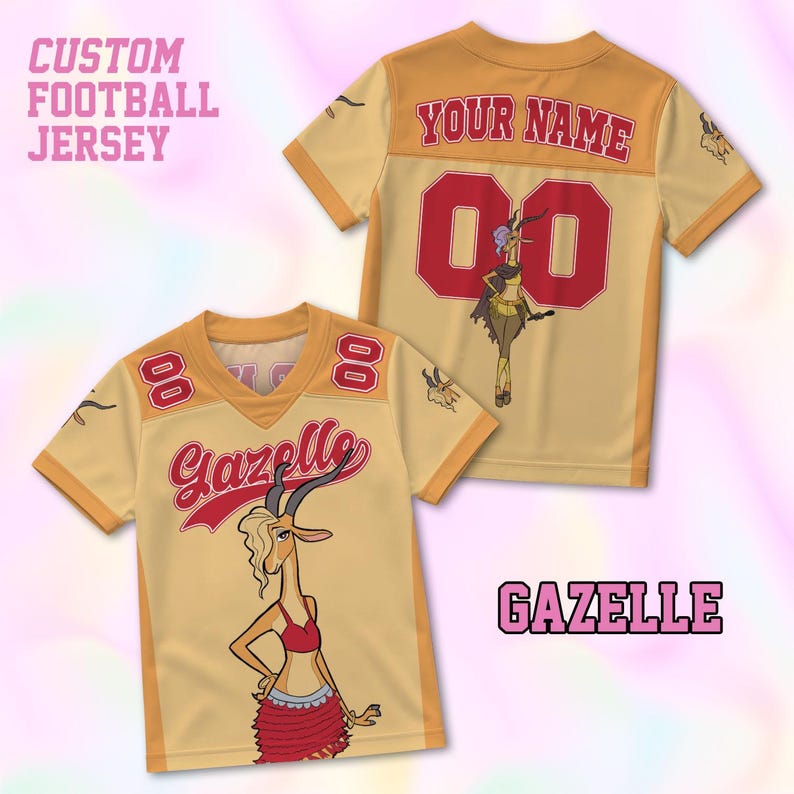 May include: Custom football jersey in tan and orange with the name "Gazelle" and the number "00" on the front. The back of the jersey has the text "YOUR NAME" and the number "00". The jersey features a cartoon gazelle character.
