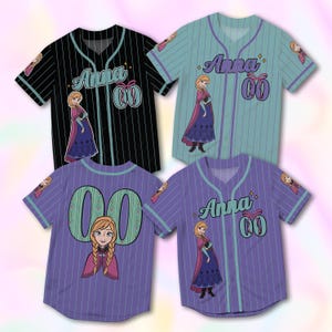 May include: Four baseball jerseys in black, teal, and purple with vertical stripes. Each jersey features the name "Anna" in script, a cartoon image of a character, and the number "00".