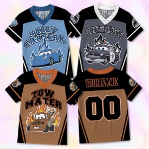 May include: Four short-sleeve V-neck jerseys featuring Disney Cars characters. One is light blue with Sally Carrera, one is gray with Sheriff, and two are brown with Tow Mater, including one back view with the text YOUR NAME and 00.