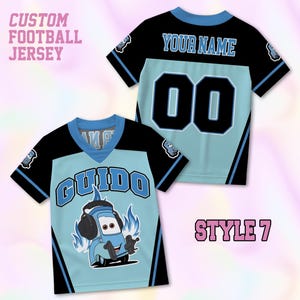May include: A custom football jersey featuring a light blue and black color scheme. The front displays the name GUIDO above a cartoon car character with headphones and blue flames. The back shows the text YOUR NAME and the number 00.