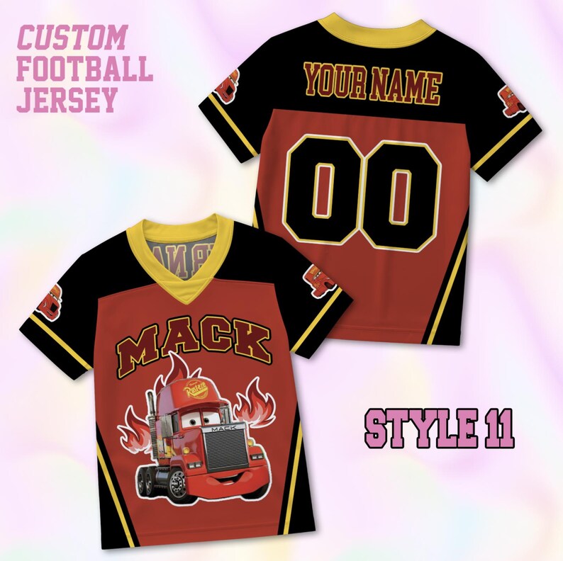 May include: A custom football jersey featuring a red and black design with yellow trim. The front displays a cartoon truck graphic with the text MACK and flames. The back shows the text YOUR NAME and the number 00. Text reads CUSTOM FOOTBALL JERSEY.