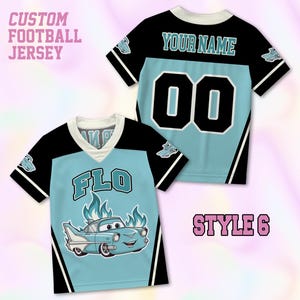 May include: A custom football jersey featuring a light blue and black color scheme. The front displays the name FLO above a cartoon car graphic with flames. The back shows the text YOUR NAME and the number 00. The text CUSTOM FOOTBALL JERSEY and STYLE 6 are visible.