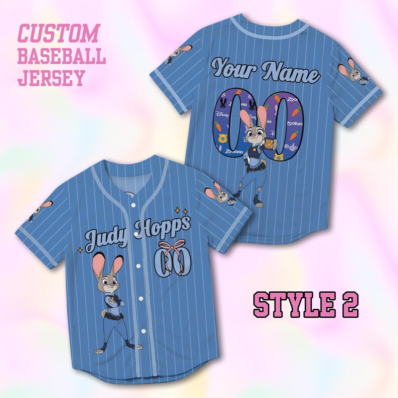 May include: Light blue baseball jersey with white pinstripes, featuring a cartoon bunny character. The jersey has the text "Judy Hopps" and "Your Name" on the front and back, with the number "00". The words "Custom Baseball Jersey" and "Style 2" are also visible.
