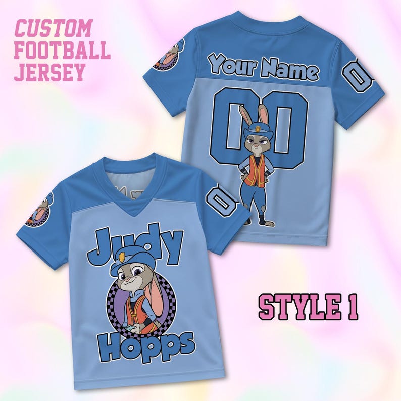 May include: A light blue football jersey featuring a graphic of Judy Hopps in a police uniform. The front displays the text Judy Hopps, while the back shows the text Your Name above the number 00. The sleeves feature a checkered pattern.