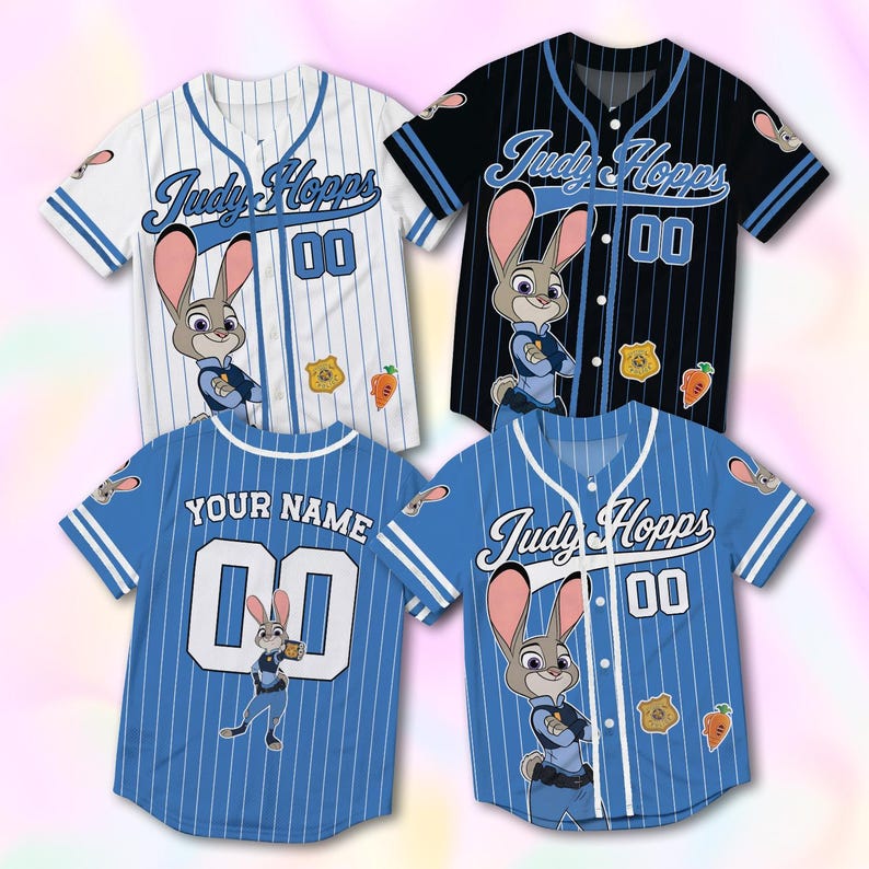 May include: Four short-sleeved button-down baseball jerseys featuring Judy Hopps graphics. The shirts come in white, black, and blue with pinstripes, the text Judy Hopps, the number 00, a police badge, and a carrot icon on the front or back.